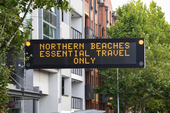 Digital road signs warn against travel to the Northern Beaches in the suburb of Crows Nest on December 20, 2020 in Sydney.