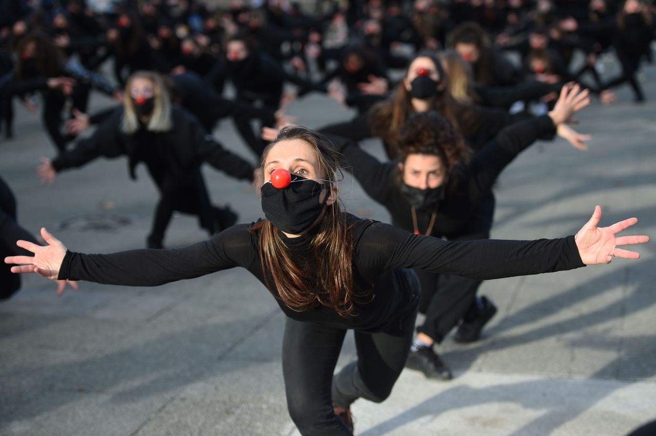 One hundred eighty performers from the group "Les Essentiels" dance on Dec. 12 in Montpellier to protest against the government's health policy and the decisions it took with regard to the cultural world in France.