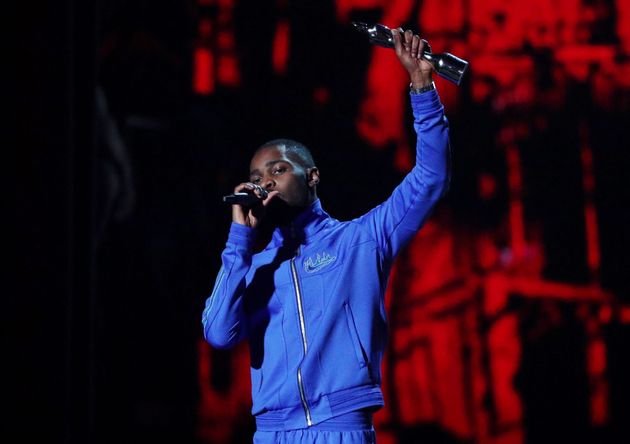 Dave receives the award for Mastercard Album Of The Year at the Brit Awards at the O2 Arena in London, Britain, February 18, 2020 REUTERS/Hannah Mckay