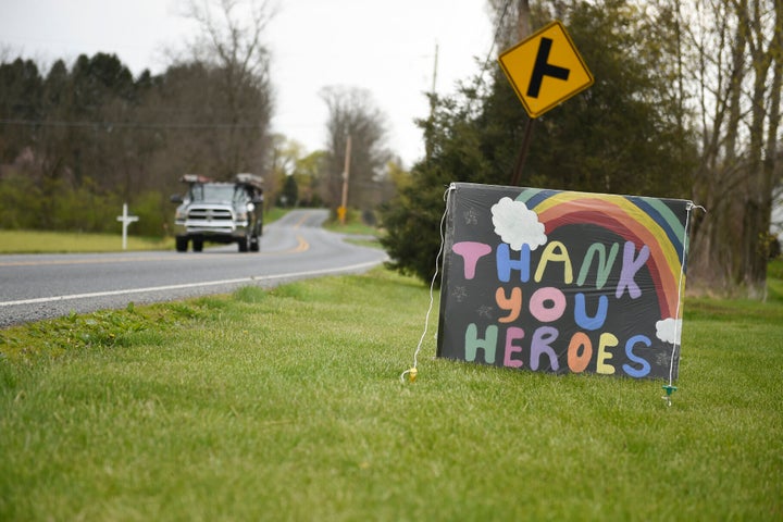 A homemade sign reads "Thank You Heroes" in a yard in Leesport, Pennsylvania, on April 23, 2020.