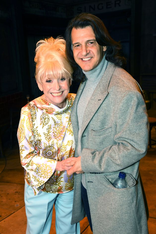 LONDON, ENGLAND - APRIL 03: Barbara Windsor poses with husband Scott Mitchell as she meets the cast of 