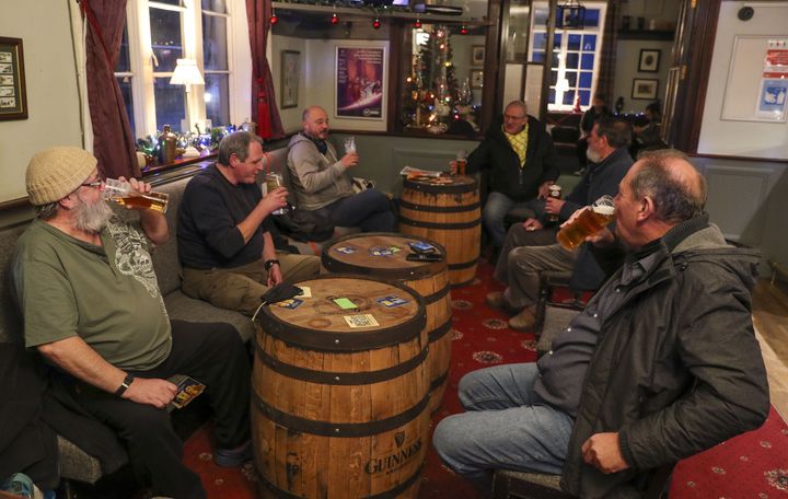 People drink in the Prince of Wales pub in East Cowes, Isle of Wight, after the second national lockdown ended earlier this month.