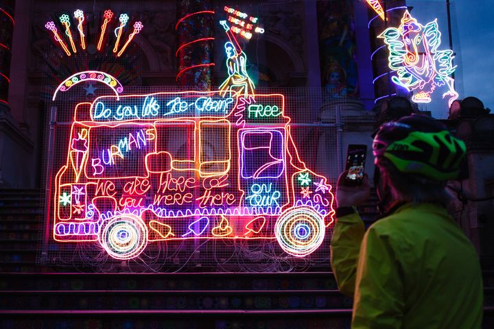Neon light installation 'Remembering A Brave New World', by British artist Chila Kumari Singh Burman, covers the facade of the Tate Britain art gallery in London. The work combines Hindu mythology, Bollywood imagery, colonial history and personal memories.