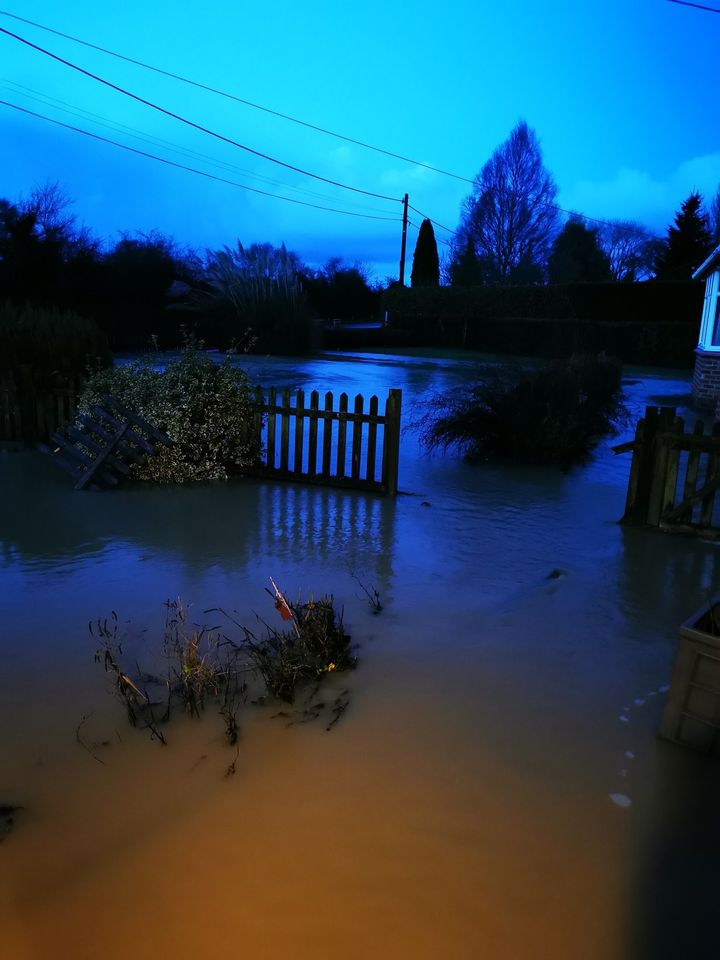Handout photo courtesy of Peter Lloyd of flooding at his home in Peterborough, Cambridgeshire after heavy rain overnight.