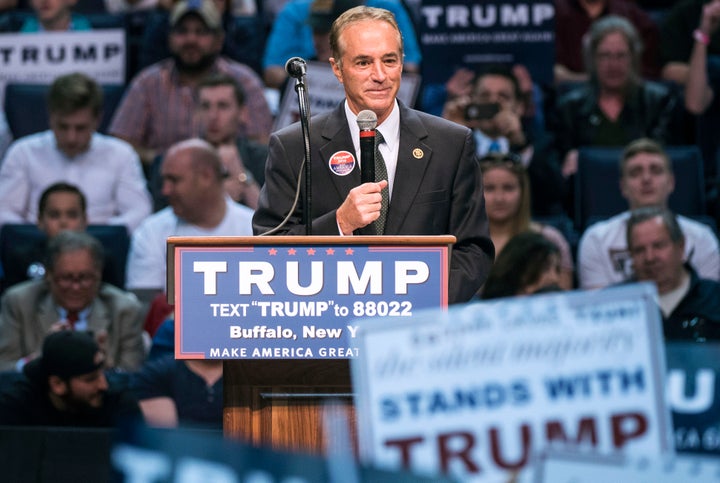 Then-Rep. Chris Collins speaks at a campaign rally for Trump in 2016. A few years later: pardon.