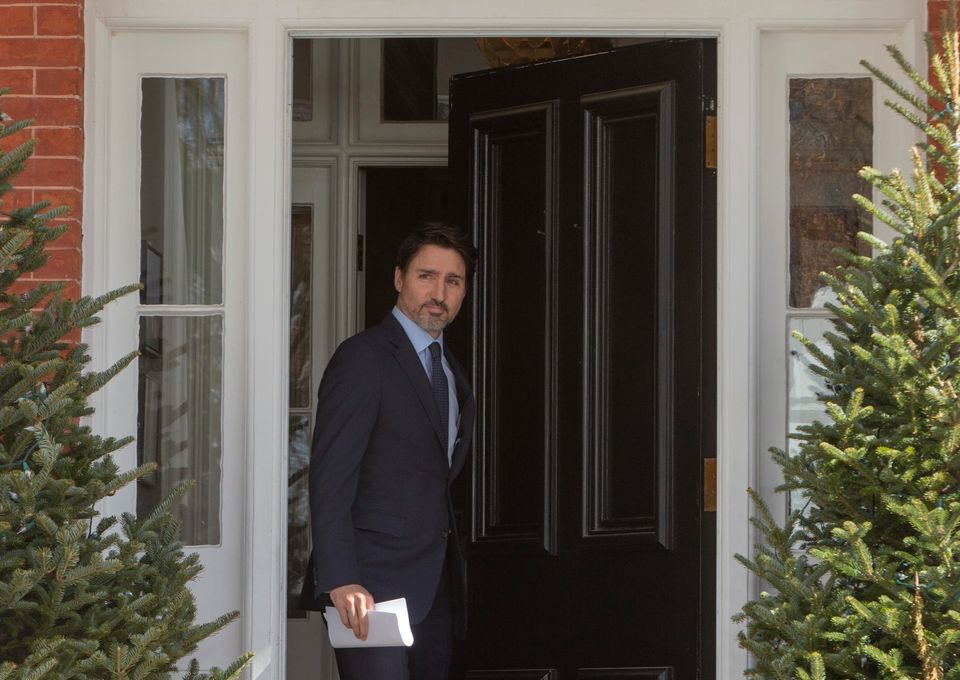 Prime Minister Justin Trudeau emerges from Rideau Cottage to hold a news conference in Ottawa on March...