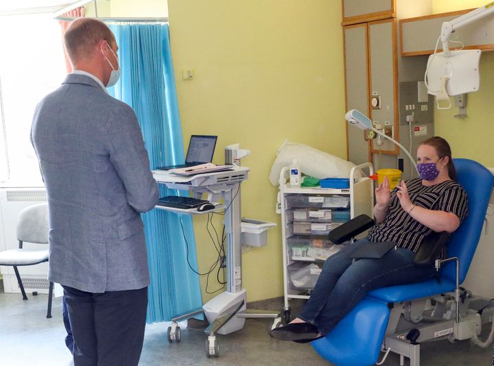 The Duke of Cambridge talks to a patient participating in the Covid-19 vaccine trial back in June.
