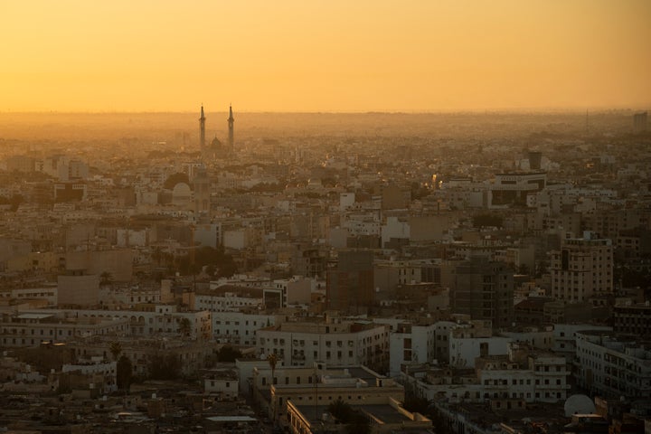 The sun rises over Tripoli, Libya, Friday, Feb. 28, 2020. (AP Photo/Felipe Dana)