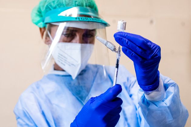 A medical staff is preparing for the Pfizer / Bioentech COVID-19 vaccine.  Members of the European Union (EU) have started vaccinations immediately.  Turin, Italy.  Year 2020