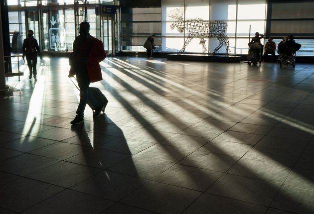 A passenger walks the halls at Montreal Trudeau Airport during the COVID-19 pandemic in Montreal on Dec....