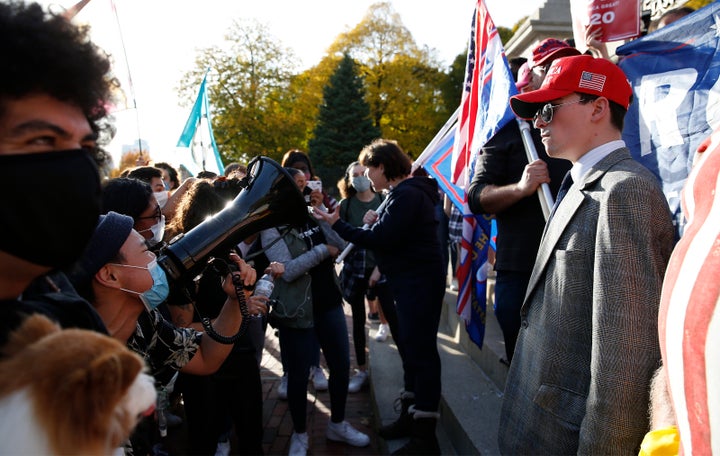 Biden supporters and Trump supporters faced off at the State House in a mostly peaceful confrontation in Boston on Nov. 7, 20