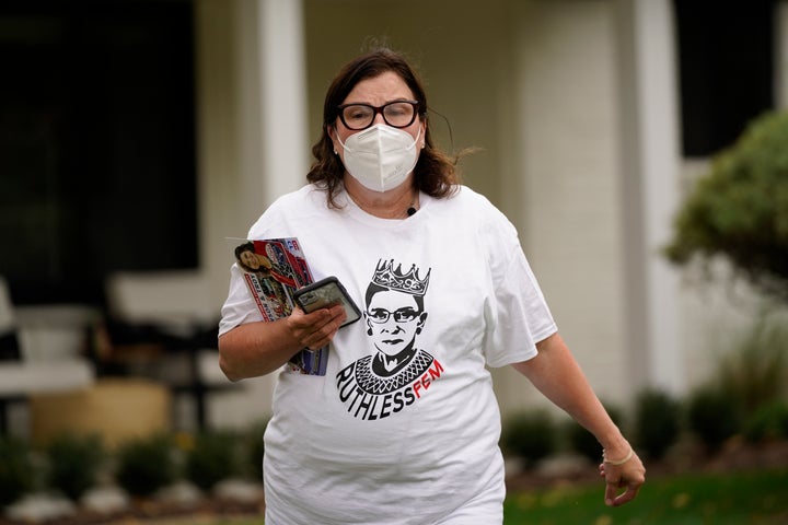 Lori Goldman canvasses in Troy, Mich., on Oct. 15, 2020. 