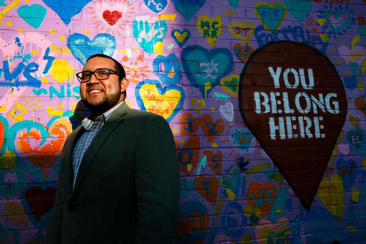 In this March 10, 2020 file photo, Ricky Hurtado poses for a portrait by a mural in Graham, N.C. 