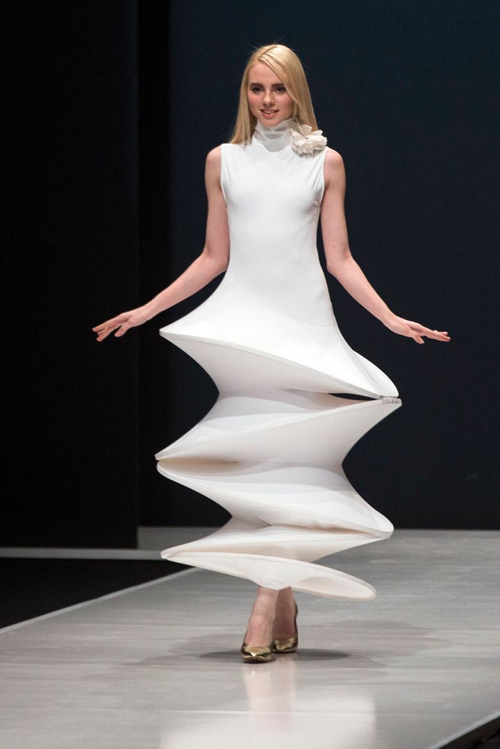 A model displays a creation  Pierre Cardin during Moscow Fashion Week in 2016.
