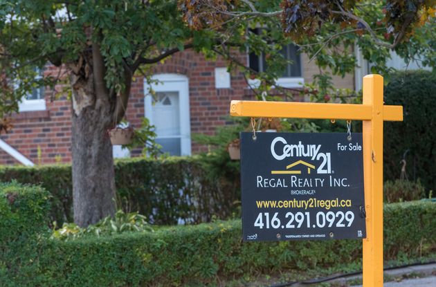 A Century 21 for sale sign in Toronto, Oct. 12,