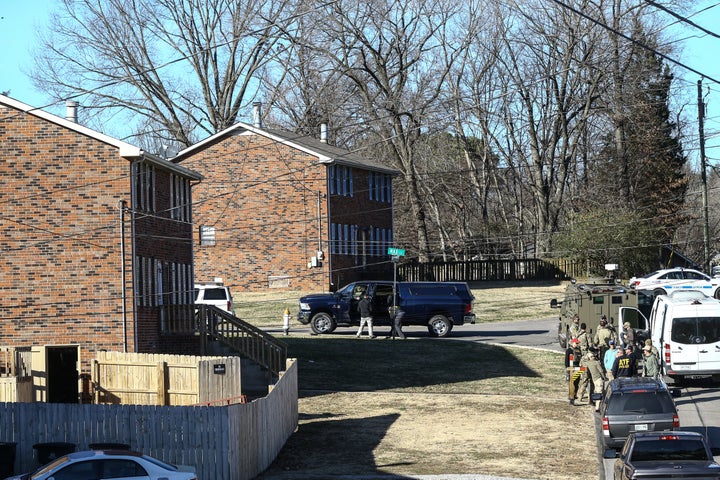 Police investigate the house belonging to Warner in Nashville on Saturday.