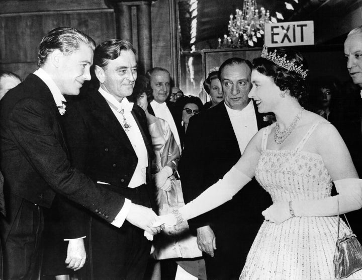 Queen Elizabeth at the Dec. 10, 1962 premiere of "Lawrence of Arabia," wearing the dress her granddaughter would later get married in.