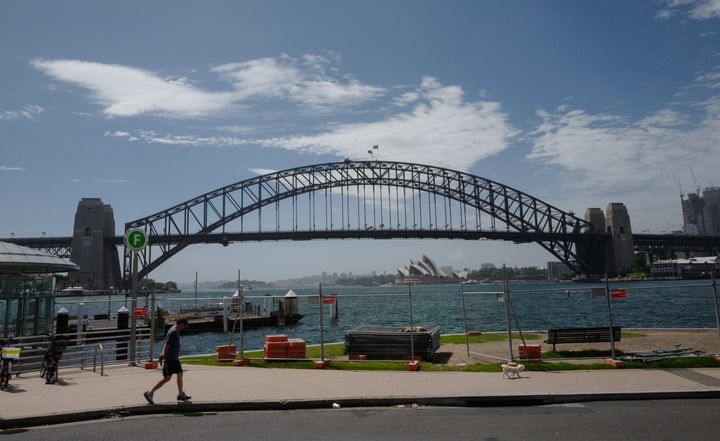 Security fencing begins to be positioned at McMahons Point with the Harbour Bridge and Opera House as backdrop 