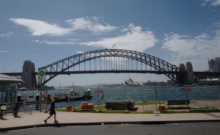 Security fencing begins to be positioned at McMahons Point with the Harbour Bridge and Opera House as backdrop 