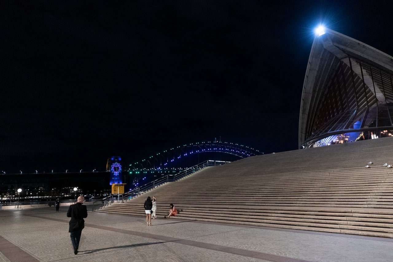 A near-empty Sydney Opera House forecourt during New Year's Eve celebrations.