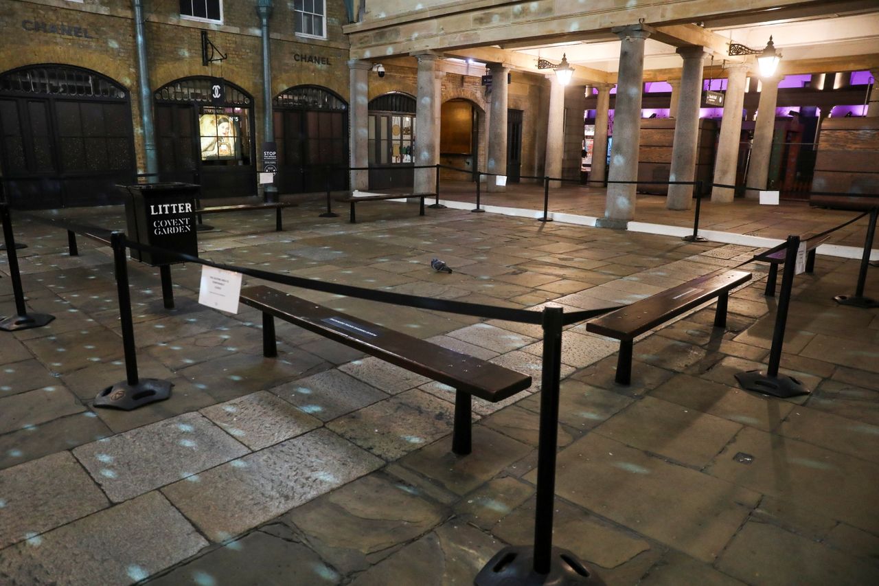 A pigeon sits in a square in Covent Garden during the New Year's Eve amid the coronavirus disease outbreak in London.