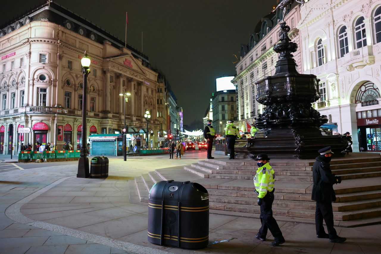 <strong>Police officers are pictured at Piccadilly Circus during New Year's Eve.</strong>
