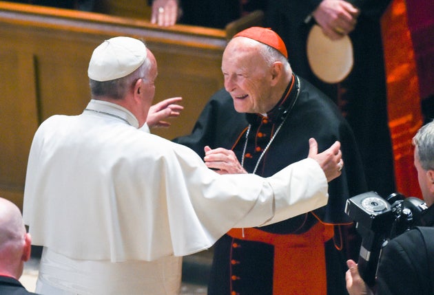 In this 2015 file photo, Francis reaches out to hug then-Cardinal Archbishop emeritus Theodore McCarrick at the Cathedral of St. Matthew the Apostle in Washington, D.C.