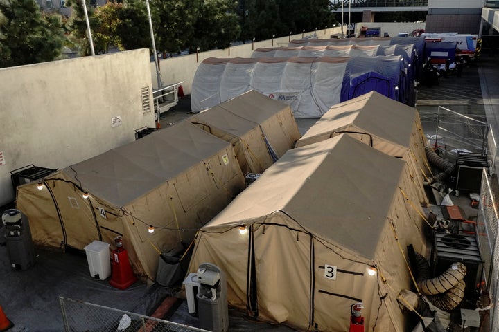 Triage tents for treating COVID-19 patients are seen outside LAC + USC Medical Center this past weekend.