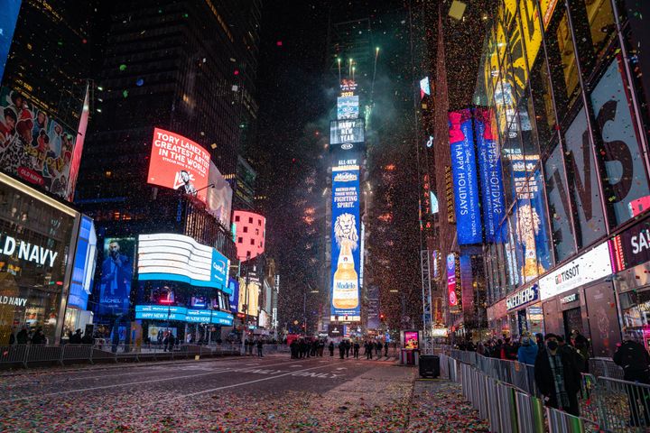 The New Year's Eve ball drops in a mostly empty Times Square on January 1, 2021, in New York City. On average, about one million revelers are drawn to the Crossroads of the World to watch performances and celebrate the New Year. This year a limited live audience of about 40 first responders and essential workers were allowed to watch the New Years' ball drop from a secure area in Times Square. (Photo by David Dee Delgado/Getty Images)