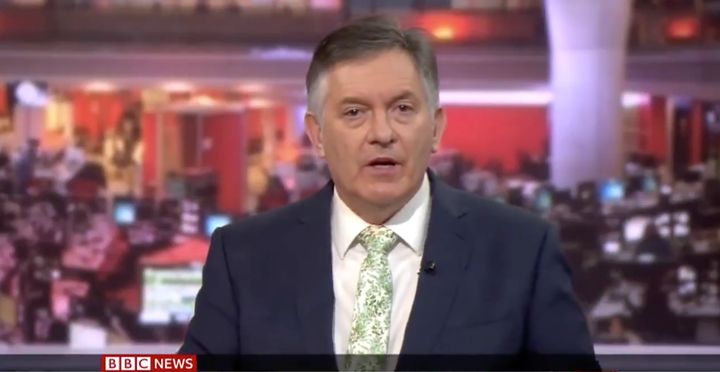 Simon McCoy presenting live on BBC News last year