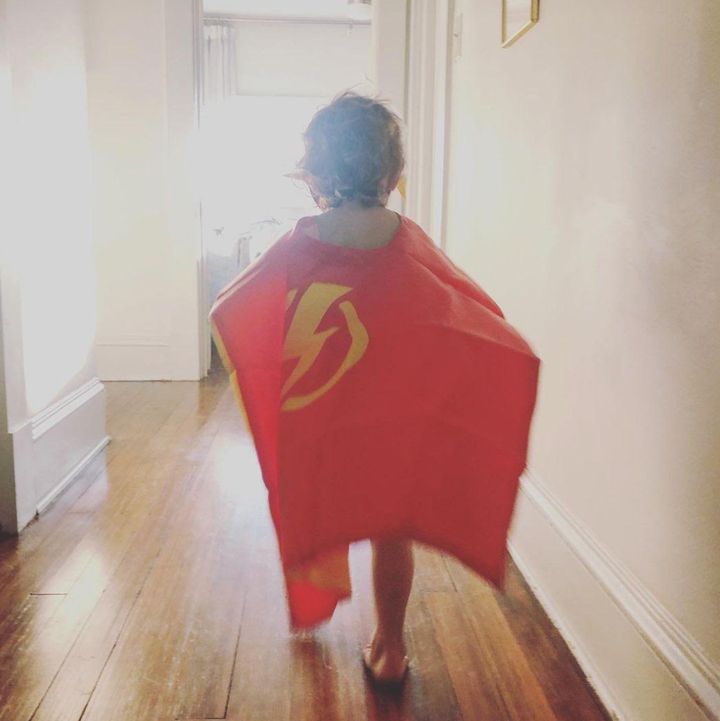 Oscar wearing his Flash costume