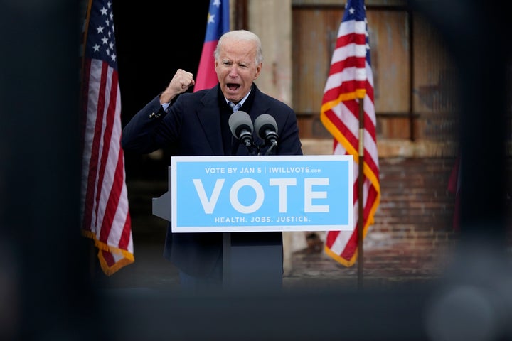 President-elect Joe Biden speaks at a drive-in rally for Georgia Democratic candidates for U.S. Senate Raphael Warnock and Jon Ossoff, Tuesday, Dec. 15, 2020, in Atlanta. (AP Photo/Patrick Semansky)