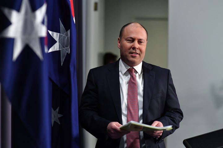 Australian Treasurer Josh Frydenberg arrives to address media during a press conference in the Blue Room at Parliament House on December 08, 2020 in Canberra, Australia. 