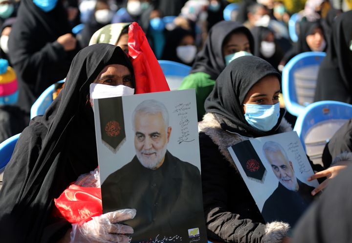 People attend a ceremony in Iran on Saturday to commemorate the first anniversary of the death of Qassem Soleimani.