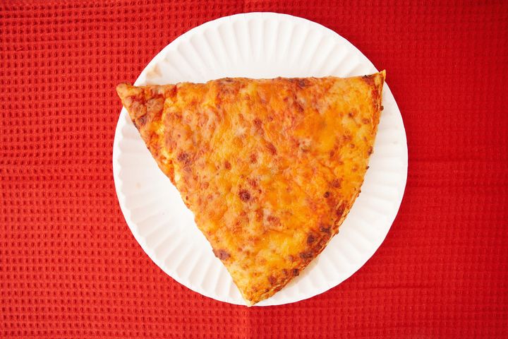 Blotting pizza with a napkin actually works to soak up excess oil.