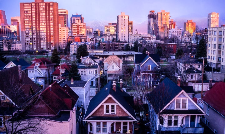 Houses and apartment buildings in Vancouver's West End. Canadians went on a December home-buying spree, new data shows.