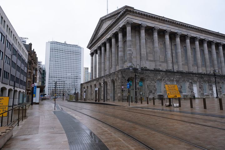 The lockdown begins in Birmingham, which was deserted outside the town hall on Wednesday