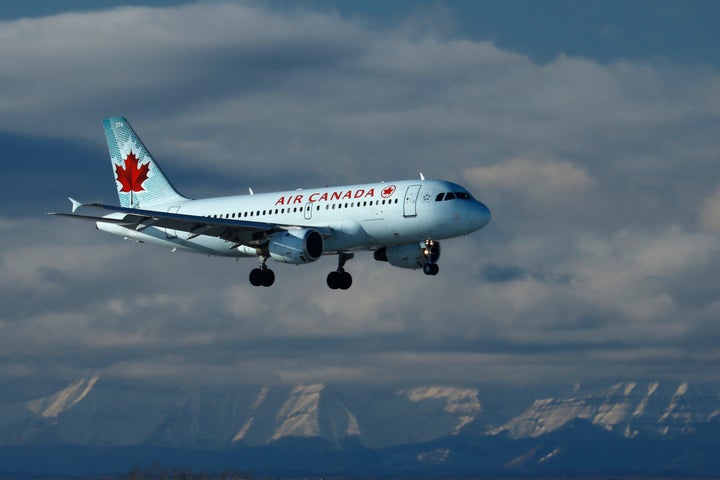An Air Canada plane lands in Calgary, Alberta on Nov. 28, 2020.