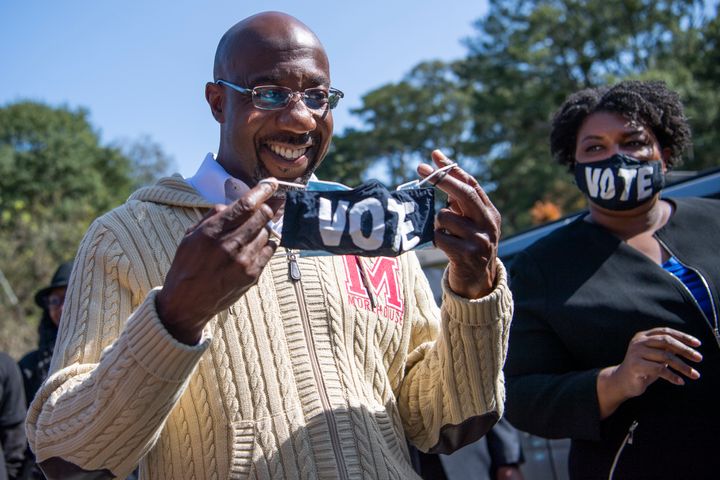 Rev. Raphael Warnock, one of the two Democratic Senate candidates in Georgia, and Stacey Abrams, a former candidate for Georgia governor, at a Sunday campaign event in Atlanta. Warnock won election.