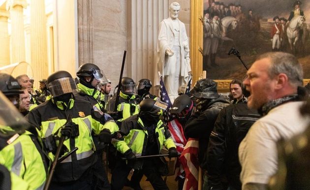 Police intervenes in Trump supporters who breached security and entered the Capitol building in Washington D.C., on January 06, 2021.