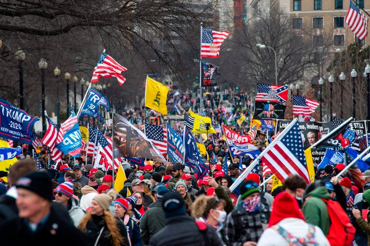 Thousands of supporters of US President Donald Trump march through the streets of the city as they make their way to the Capitol Building in Washington, DC on January 6, 2021.
