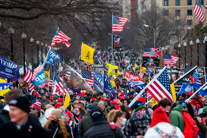 Thousands of supporters of US President Donald Trump march through the streets of the city as they make their way to the Capitol Building in Washington, DC on January 6, 2021. 