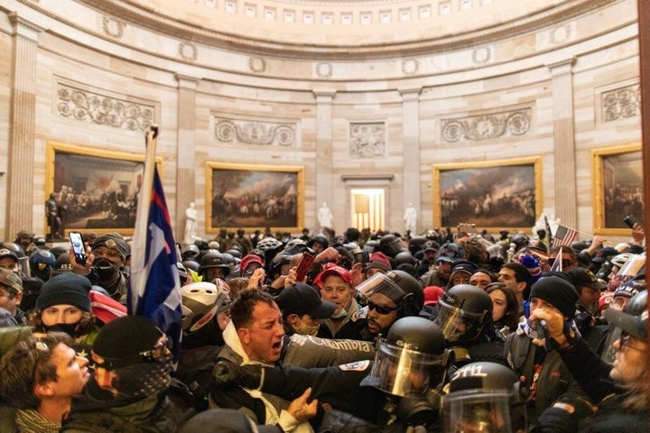 Police intervene after supporters of President Donald Trump breached security and entered the Capitol building in Washington, D.C., on Jan. 6.