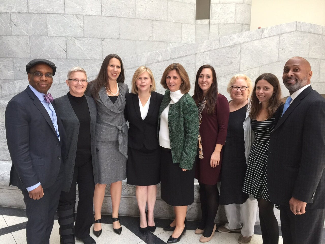 Lisa Montgomery's legal team, pictured in 2016. Kelley Henry is fourth from the left. Her co-counsel, Amy Harwell, is standing on her left.