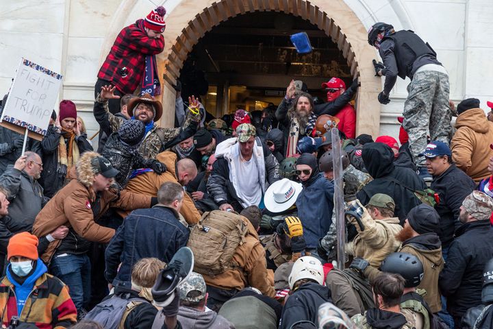 Rioters clash with police as they try to enter the Capitol on Jan. 6.