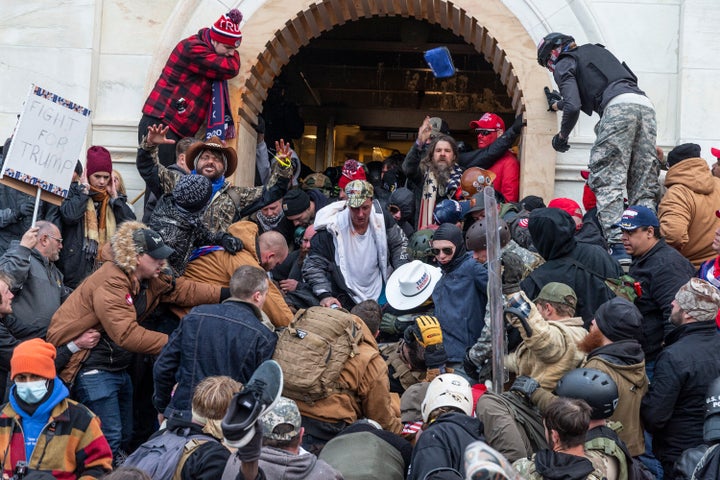 Rioters clash with police as they try to enter the Capitol on Jan. 6.