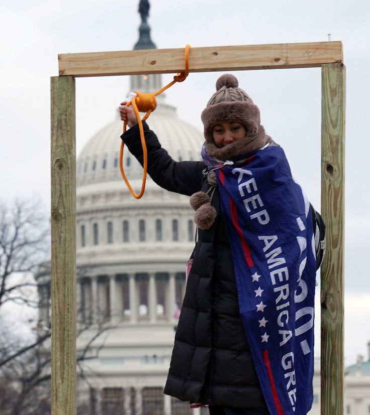 A supporter of President Donald Trump holds a noose outside the U.S. Capitol Building in Washington, D.C., on Wednesday.