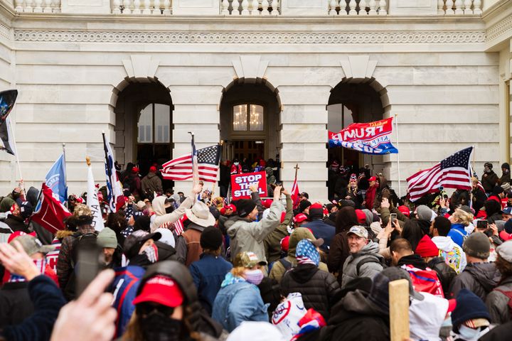 A pro-Trump mob floods into the Capitol Building after breaking into it on Jan. 6.