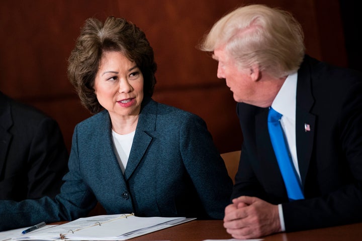 Transportation Secretary Elaine Chao and President Donald Trump participate in a roundtable discussion at the U.S. Department of Transportation on June 9, 2017.