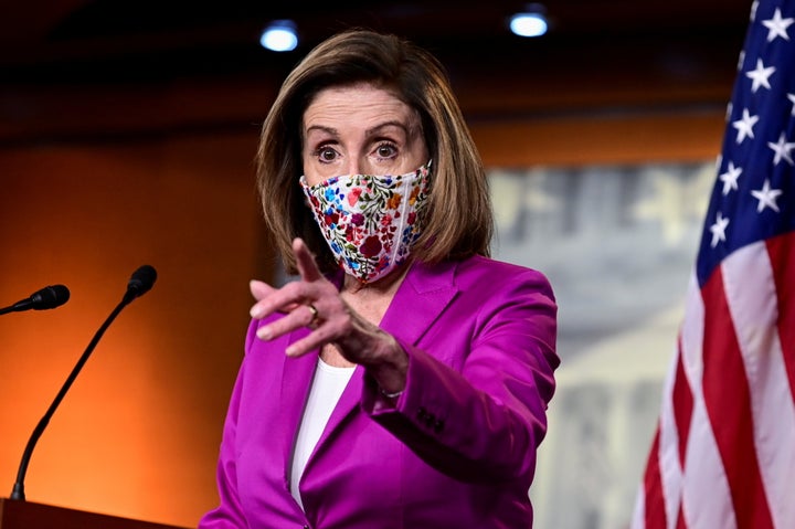 House Speaker Nancy Pelosi (D-CA) speaks to reporters a day after supporters of President Donald Trump occupied the Capitol,